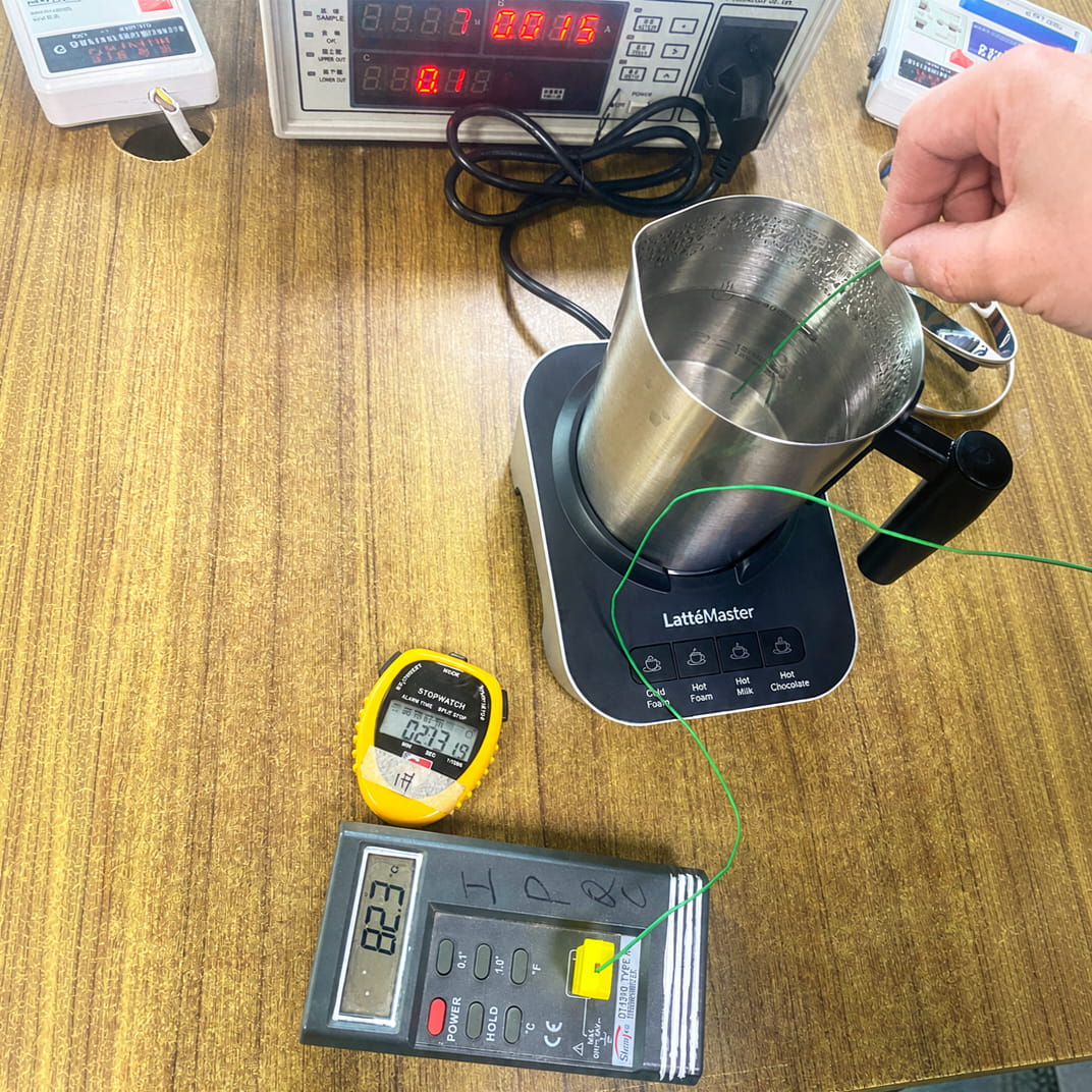 Testing private-label cappuccinatore machines at a factory in China
